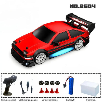 1:24 High-Speed RC Racing Drift Car Set – LED Lights, Rechargeable 3.7V Battery, Spare Tires & Road Cones